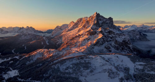 Aerial drone view of the Mountain Pelmo in the Dolomites, Italy at sunrise - Starpik Stock