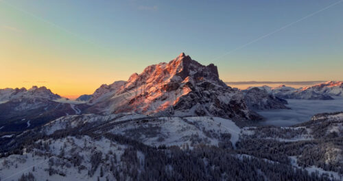 Aerial drone view of the Mountain Pelmo in the Dolomites, Italy at sunrise - Starpik Stock