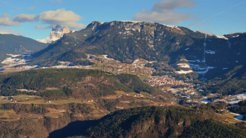 Aerial drone view of the Soprabolzano village on the Renon plateau in the Dolomites, Italy - Starpik Stock