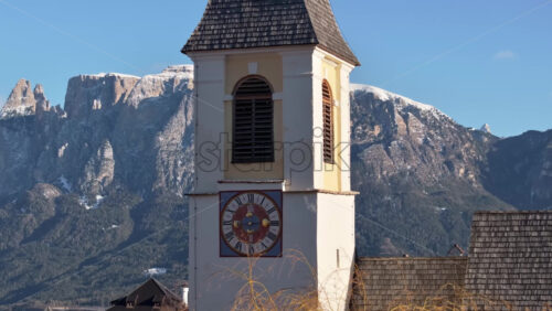 Aerial drone view of the church in Soprabolzano village on the Renon plateau in the Dolomites, Italy - Starpik Stock
