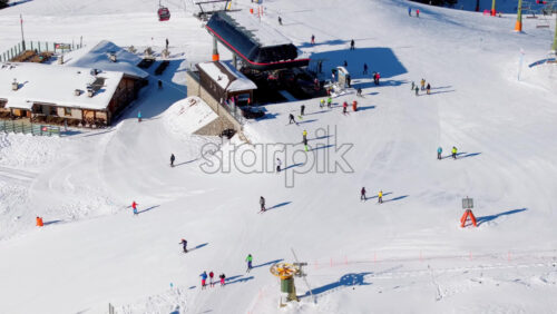 Alleghe, Italy – January 12, 2025: Aerial drone view of a ski resort in Col dei Baldi, Alleghe, in the Dolomites, Italy in daylight - Starpik Stock