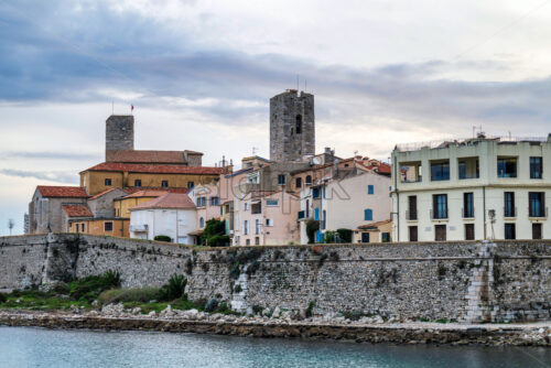 Antibes castle and central square, wall and tower by the sea - Starpik Stock
