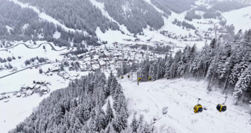 Corvara in Badia, Italy – January 9, 2025: Aerial drone view of a ski lift in Corvara, in South Tyrol, the Dolomites - Starpik Stock