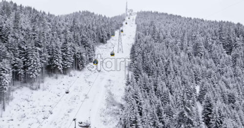Corvara in Badia, Italy – January 9, 2025: Aerial drone view of a ski lift in Corvara, in South Tyrol, the Dolomites - Starpik Stock