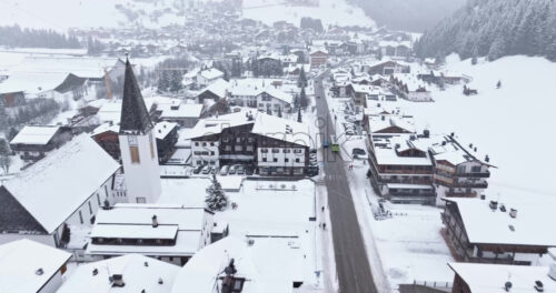 Corvara in Badia, Italy – January 9, 2025: Aerial drone view of the Corvara village covered in snow, in South Tyrol, Dolomites, in northern Italy - Starpik Stock