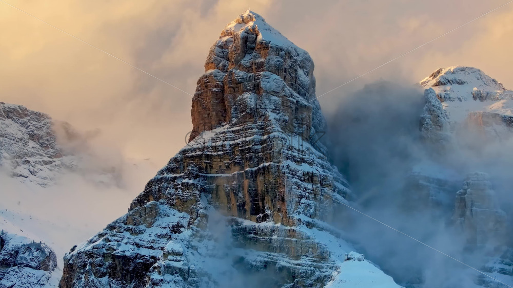 video Aerial drone view of snow on the mountains in the Dolomites, Italy - Starpik Stock