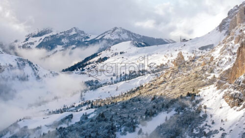 video Aerial drone view of the Gardena Pass high mountain pass in the Dolomites, Italy - Starpik Stock