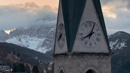 video Aerial drone view of the San Lorenzo Church in the Selva di Cadore comune, in the Dolomites, Italy - Starpik Stock