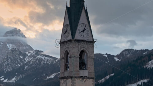 video Aerial drone view of the San Lorenzo Church in the Selva di Cadore comune, in the Dolomites, Italy - Starpik Stock