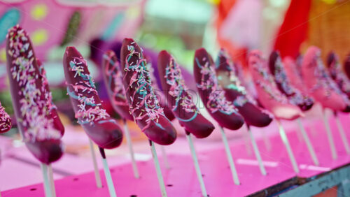 Chocolate covered bananas at a street food market in Japan - Starpik Stock