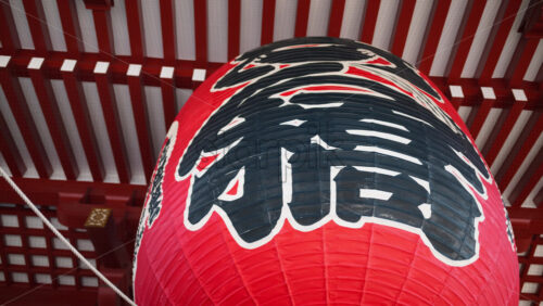 Close up of a red hanging lantern at the Senso-ji temple Asakusa, Tokyo, Japan - Starpik Stock