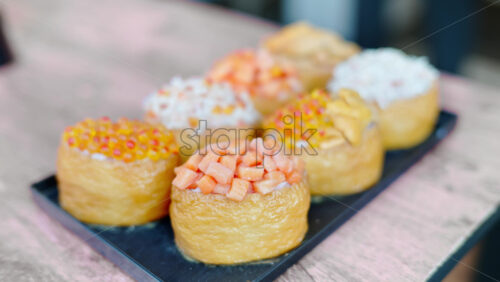 Close up of rolls at the Tsukiji Fish Market in Chuo, Japan - Starpik Stock