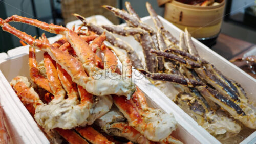 Red king crab meat on display at the Tsukiji Fish Market in Japan - Starpik Stock