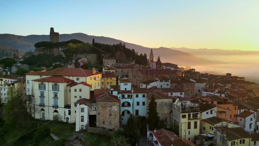 Aerial drone view of the Barga medieval town and comune of the province of Lucca in Tuscany, Italy - Starpik Stock