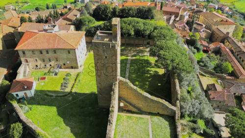 Aerial drone view of the Cassero Tower in Castiglion Fiorentino, Tuscany, Italy - Starpik Stock