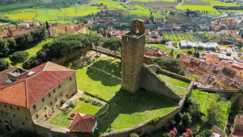 Aerial drone view of the Cassero Tower in Castiglion Fiorentino, Tuscany, Italy - Starpik Stock