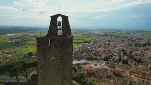 Aerial drone view of the Cassero Tower in Castiglion Fiorentino, Tuscany, Italy - Starpik Stock