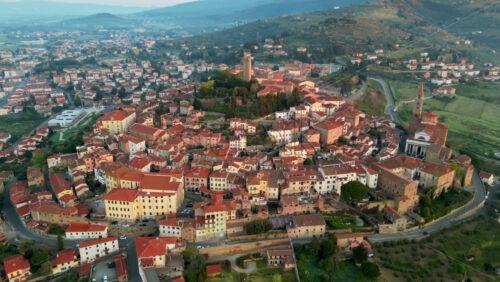 Aerial drone view of the Castiglion Fiorentino small, walled city in eastern Tuscany, Italy - Starpik Stock