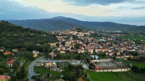 Aerial drone view of the Castiglion Fiorentino small, walled city in eastern Tuscany, Italy - Starpik Stock