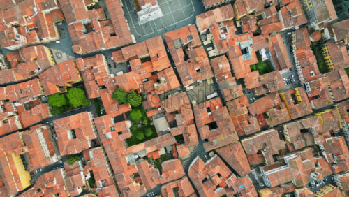 Aerial drone view of the Lucca city on the Serchio river in Italy’s Tuscany region - Starpik Stock