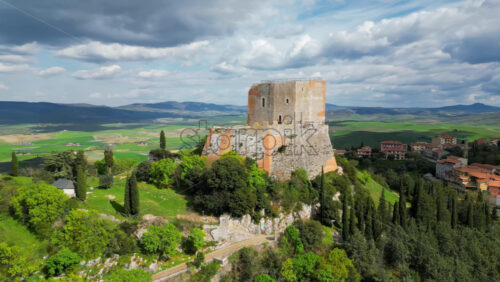 Aerial drone view of the Rocca d’Orcia village in Tuscany, central Italy - Starpik Stock