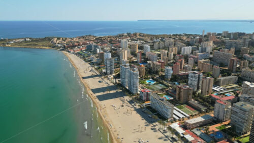 Aerial drone view of the buildings in Benidorm, Spain in daylight - Starpik Stock
