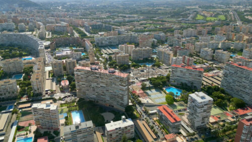 Aerial drone view of the buildings in Benidorm, Spain in daylight - Starpik Stock