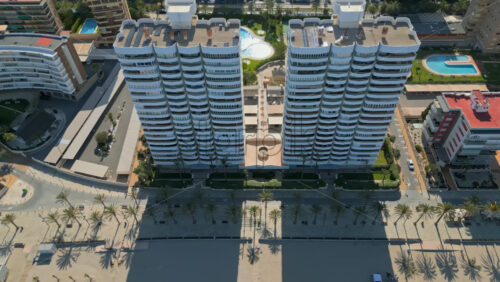 Aerial drone view of the buildings in Benidorm, Spain in daylight - Starpik Stock