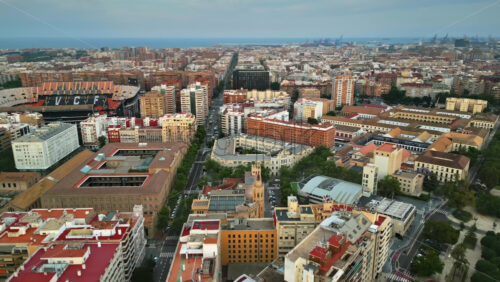 Aerial drone view of the buildings in Valencia, Spain in daylight - Starpik Stock