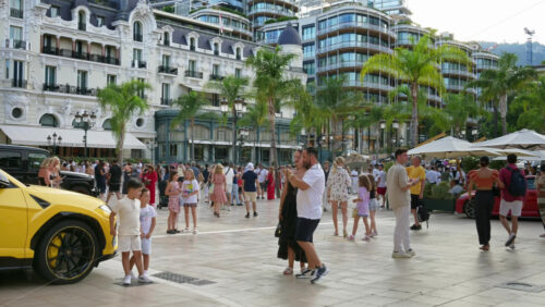 Video - Monte Carlo, Monaco - October 4, 2024: People walking through the courtyard of the Monte-Carlo Casino