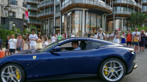 Video - Monaco city, Monaco - September 14, 2024: People and cars moving on the streets of the city
