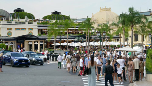 Video - Monaco city, Monaco - September 14, 2024: People and cars moving on the streets of the city