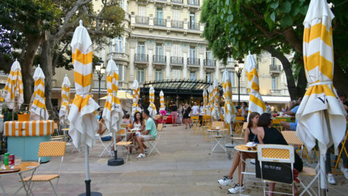 Video - Monaco City, Monaco - September 4, 2024: People eating at terraces in the city