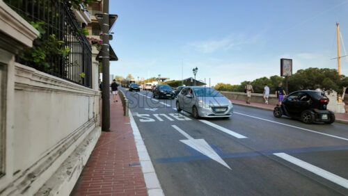 Video - Monaco city, Monaco - September 14, 2024: People and cars moving on the streets of the city