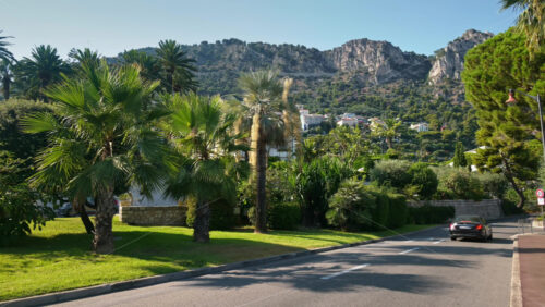 Video - Beaulieu-sur-Mer, France - July 5, 2024: Cars moving on the streets of the city in daylight