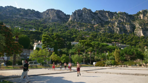 Video - Beaulieu-sur-Mer, France - July 5, 2024: Men playing on the Petite Afrique Beach