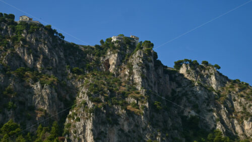 Video - Beaulieu-sur-Mer, France - July 5, 2024: People swimming and relaxing at the Petite Afrique Beach