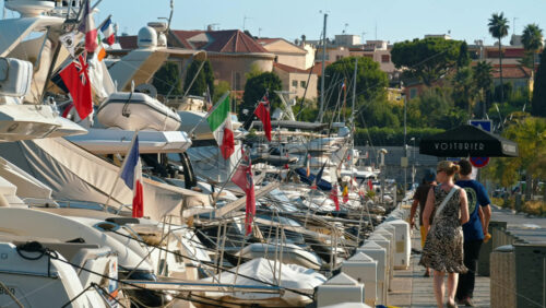 Video - Beaulieu-sur-Mer, France - July 5, 2024: People moving on the streets of the city, near the port