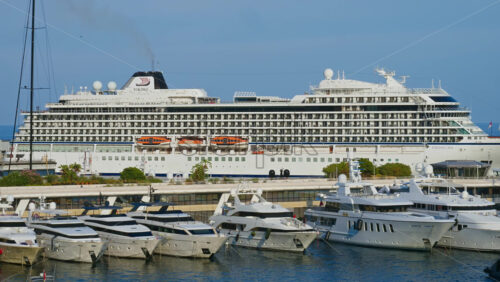 Video - La Condamine, Monaco - September 8, 2024: View of white yacht and multiple boats docked in the Monaco Marina