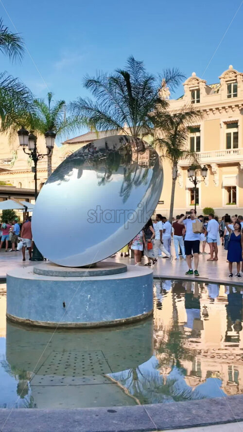 Video - Monte Carlo, Monaco - October 4, 2024: People walking in front of the Monte-Carlo Casino. Vertical
