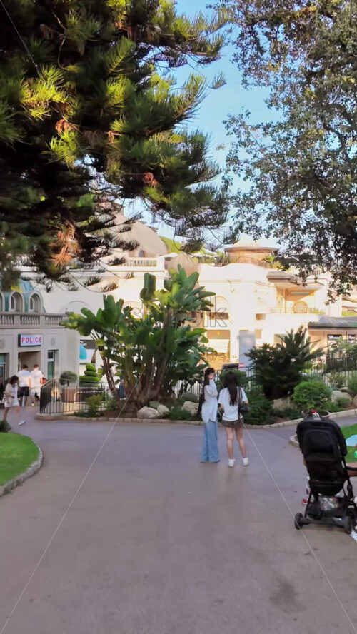Video - Monte Carlo, Monaco - October 4, 2024: People walking through The Unesco Garden in daylight. Vertical