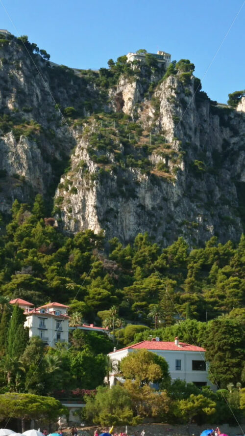 Video - Rugged cliffs and hills of the Maritime Alps, that rise behind Beaulieu-sur-Mer. Vertical