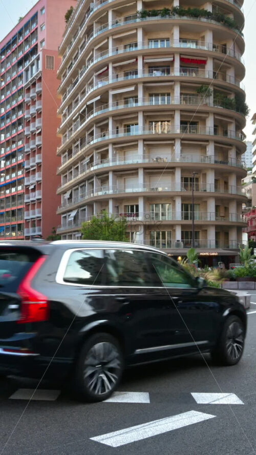 Video - Monaco city, Monaco - September 14, 2024: Cars moving on the streets of the city. Vertical