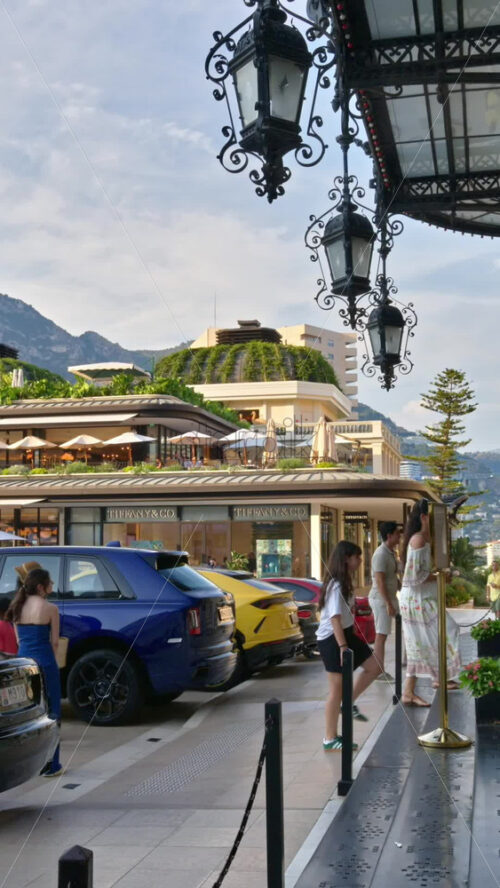 Video - Monte Carlo, Monaco - October 4, 2024: People walking in front of the Monte-Carlo Casino. Vertical