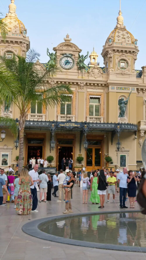Video - Monte Carlo, Monaco - October 4, 2024: People walking in front of the Monte-Carlo Casino. Vertical