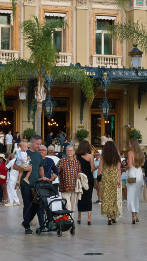 Video - Monte Carlo, Monaco - October 4, 2024: People walking in front of the Monte-Carlo Casino. Vertical