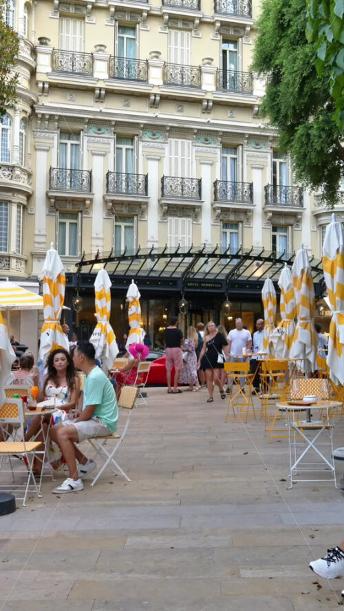 Video - Monaco City, Monaco - September 4, 2024: People eating at terraces in the city. Vertical