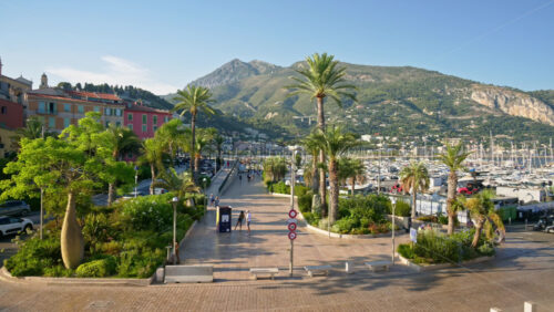 Video - Menton, France - September 4, 2024: People and cars moving on the streets of the city