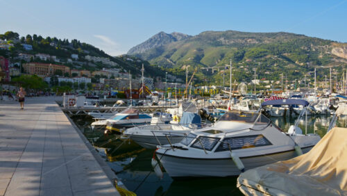 Video - Menton, France - September 4, 2024: View of boats docked in the Port de Menton in the French Riviera