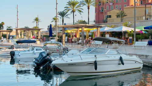 Video - Menton, France - September 4, 2024: View of boats docked in the Port de Menton in the French Riviera